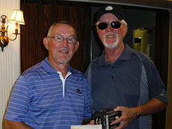 Wayne Slabach accepting congratulations from Bill Murray on his Hole-in-One at the Maplecrest tournament